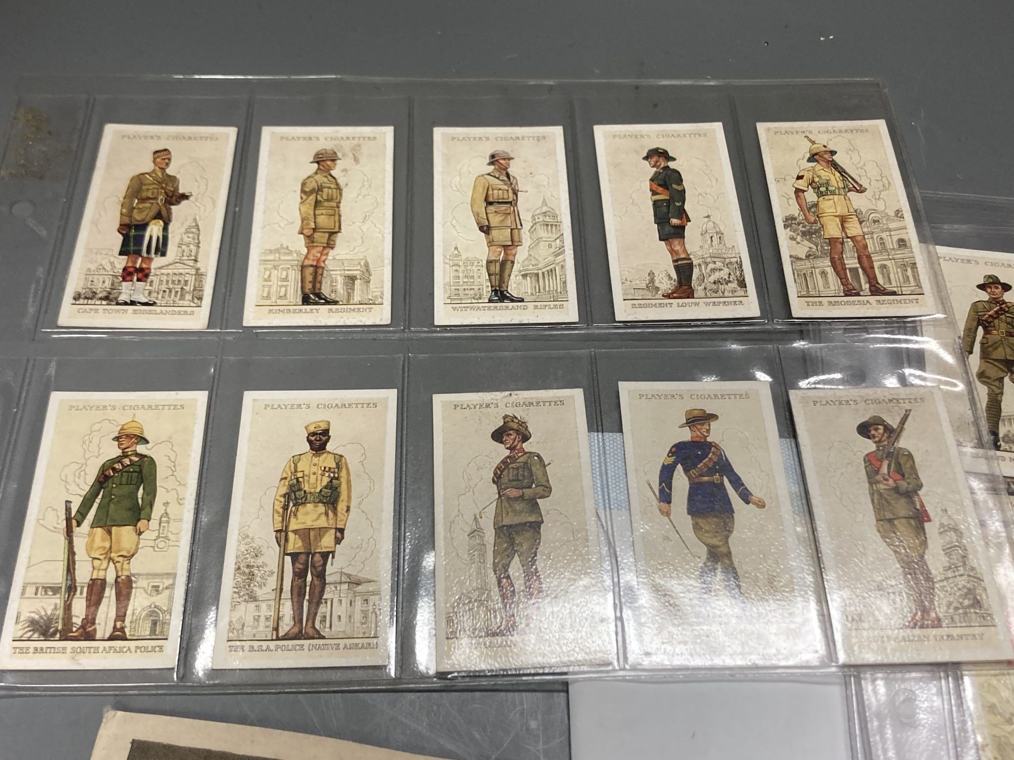 A quantity of ephemera including cigarette cards, Players Cigarettes 1938 numbered 1 - 46, Military Uniforms of the British Empire Ove